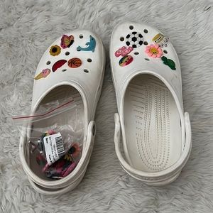 White crocs (charms included)